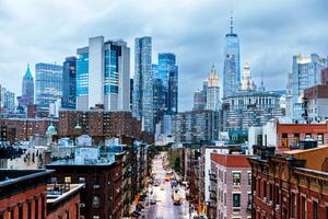 Fotografi Illuminated Manhattan Financial District skyscrapers seen, Alexander Spatari