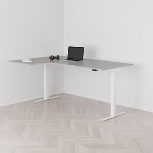 Höj och sänkbart svängt skrivbord, 2-motorigt, vänstersvängt, vitt stativ, grå bordsskiva 180x120cm