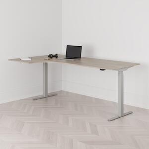 Höj och sänkbart svängt skrivbord, 2-motorigt, vänstersvängt, grått stativ, ek bordsskiva 200x120cm