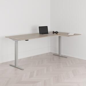 Höj och sänkbart svängt skrivbord, 2-motorigt, högersvängt, grått stativ, ek bordsskiva 200x120cm
