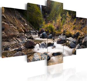 Canvas Tavla - A waterfall in the middle of wild nature - 100x50