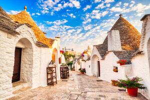 Fotografi Famous Trulli Houses during a Sunny, roman_slavik