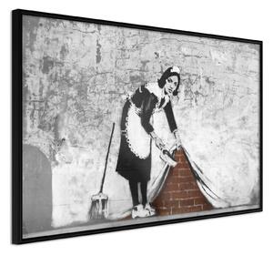 Inramad Poster / Tavla - Banksy: Sweep it Under the Carpet - 30x20 Guldram
