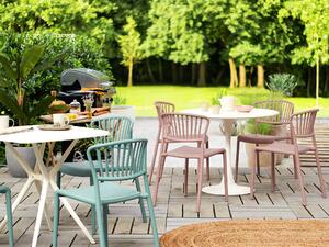 Set med 4 matstolar Rosa plast inomhus utomhus trädgård stapling minimalistisk stil Beliani