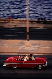 Fotografi Red Car Driving, Andreas Bauer