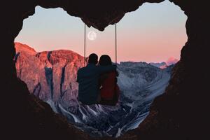 Konstfotografering Couple on swing contemplating the mountains, Artur Debat, (40 x 26.7 cm)