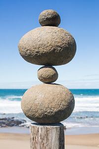 Fotografi Tower of rocks balancing on a wooden pole, Dimitri Otis, (26.7 x 40 cm)