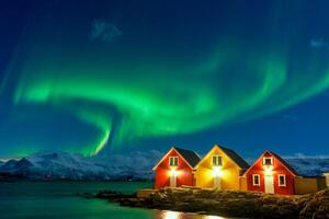 Fotografi Traditional rorbu during the Northern Lights, Roberto Moiola / Sysaworld, (40 x 26.7 cm)