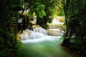 Fotografi Beautiful view of Deep forest waterfall landscape., Chanet Wichajutakul