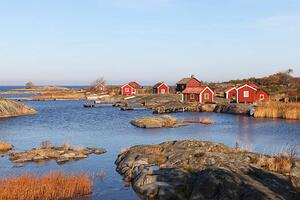 Fotografi Small cottages in autumn i archipelago, Anders Sellin