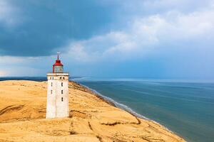 Fotografi Rabjerg mile a lighthouse on the Danish coast, TT