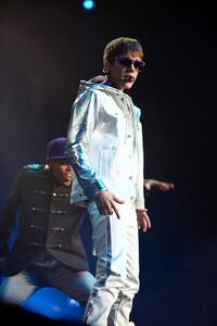 Fotografi Justin Bieber performing at the NIA