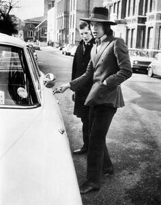 Fotografi Jagger, singer with the Rolling Stones, about to get into his car, c.1970