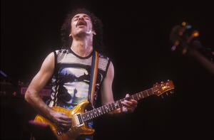 Fotografi Guitarist Carlos Santana on stage., 1985